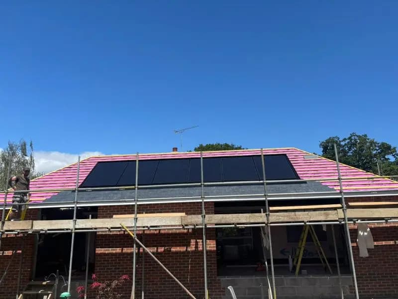 Solar panels fitted across a tiled roof